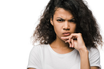 upset curly african american woman touching face isolated on white