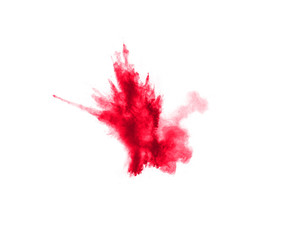 Abstract red dust splattered on white background. Red powder explosion.Freeze motion of red particles splash.