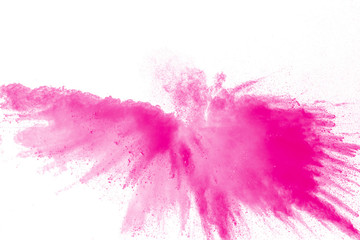 Pink dust particles splash.Pink powder explosion on white background.