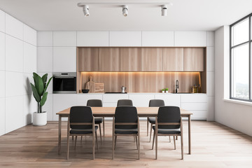 White and wood kitchen, counters and table