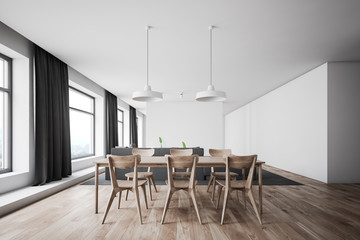 Dining room interior with sofa and table