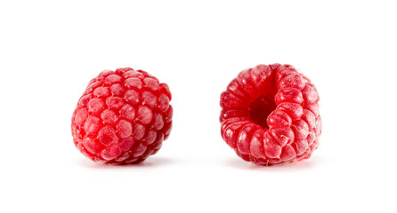 Raspberry with leaves on white background. Ripe red raspberries isolated on white background