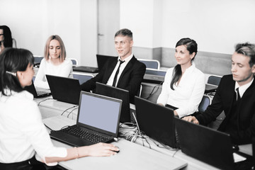 Fototapeta premium business woman holds a seminar with a business team.