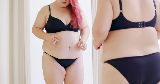 fat asian girl look mirror