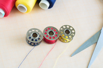 spools of thread close up, sewing supplies, place for text