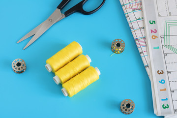 spools of thread close up, sewing supplies, place for text