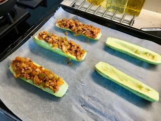 Baked Zucchini Courgettes Stuffed with Cheese and Dill.