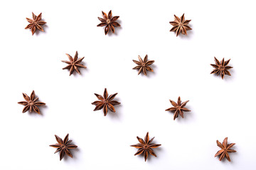 Star many Anise spice macro, delicious licoricey flavor isolated on the white background