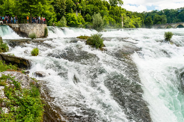 A beautiful waterfall on the river Rhine in the city Neuhausen am Rheinfall in northern Switzerland.