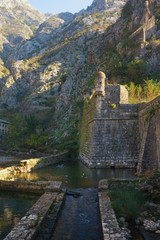 Fototapeta na wymiar Ancient fortifications. Montenegro. Fortress in Old Town of Kotor - UNESCO World Heritage site. Northern walls and Riva Bastion