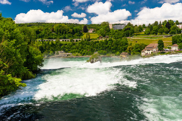 A beautiful waterfall on the river Rhine in the city Neuhausen am Rheinfall in northern Switzerland.