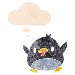 cute cartoon penguin and thought bubble in retro textured style