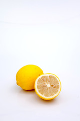 A whole and a half cut  lemon 