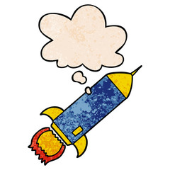 cartoon rocket and thought bubble in grunge texture pattern style