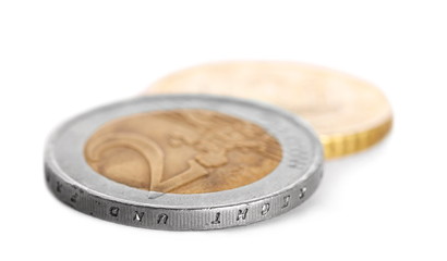 Euro coins, money isolated on white background, macro and side view