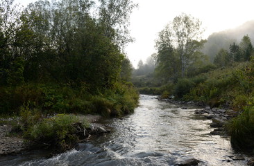 Early morning on a mountain river Yarovka in Western Siberia. Altai territory. Russia