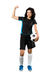 A full-length shot of a Young football player woman celebrating a victory over isolated white background