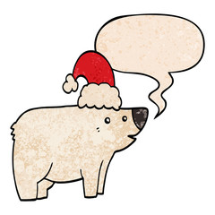 cartoon bear wearing christmas hat and speech bubble in retro texture style