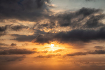 Dramatic View of a cloudscape during a dark and colorful sunset. Taken over Havana, Cuba.