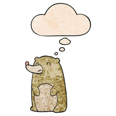 cute cartoon bear and thought bubble in grunge texture pattern style
