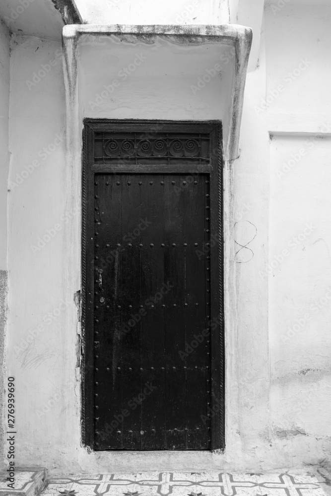 Wall mural old doors in old moroccan city