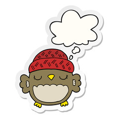 cute cartoon owl in hat and thought bubble as a printed sticker
