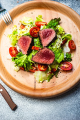 Steak salad with fresh lettuce
