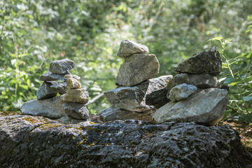 heap of stones called CAIRN in the Ruskeala Park, Republic of Karelia, Russia. This stack indicates...