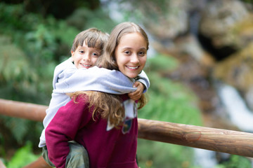 Fototapeta na wymiar Happy Girl and Boy in the Park