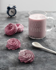 Blueberry yogurt in glass mug with 
