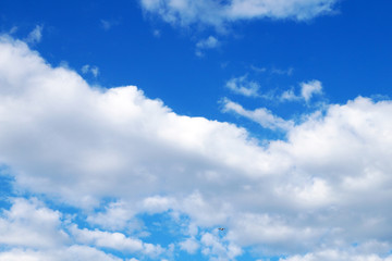 white clouds on bright blue sky for background   