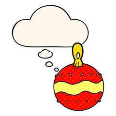 cartoon christmas bauble and thought bubble in comic book style