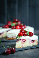 Delicious homemade cherry pie on a dark background copy space.