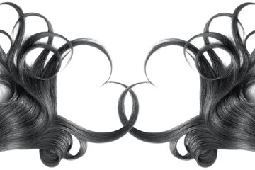 Black hair in shape of heart, isolated on white background