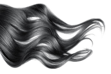 Black wavy hair isolated on white background