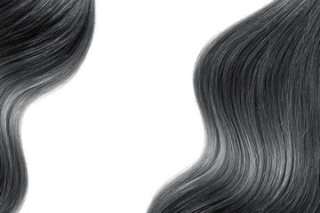 Black shiny hair as background. Copyspace