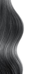 Black shiny hair as background. Copyspace