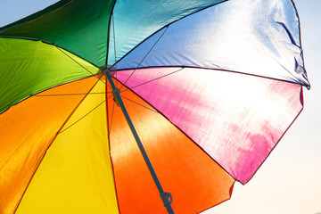 bright colorful beach umbrella for sun protection