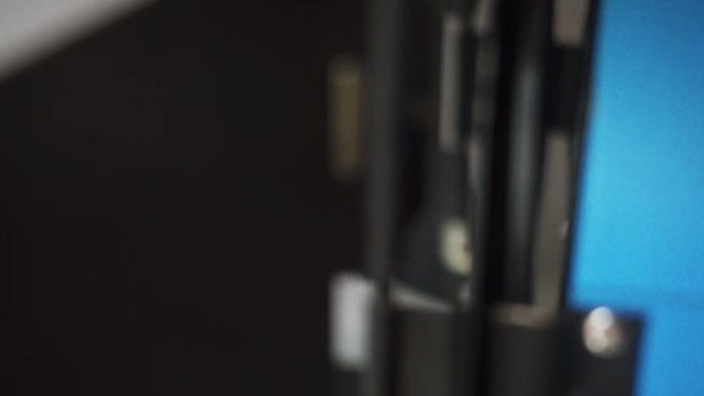 Closeup Of A Rotating Studio Light With Barn Doors.