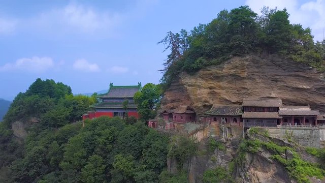 Aerial views from backside of Nanyan Palace. Temple is located at the edge of a cliff, some parts are hanging on mountain.