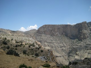 Middle East or Africa, picturesque bare mountain range and a large sandy valley desert landscapes landscape photography. Horizontal frame