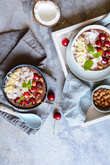 Cherry coconut smoothie bowl with banana and almonds