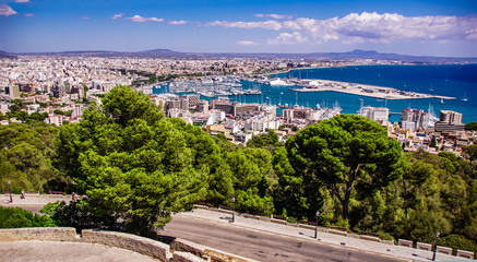 Nice  view from the ancient castle Belver on Palma de Mallorca and sea marina with sail boats in Spain © Sergii