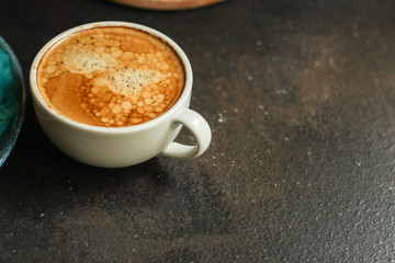 coffee freshly brewed in a white cup serving of beverage (coffee grain). food. top.copy save