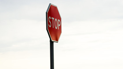 stop traffic sign, warning signs, over blue sunset sky.