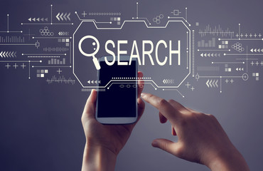 Searching theme with person holding a white smartphone