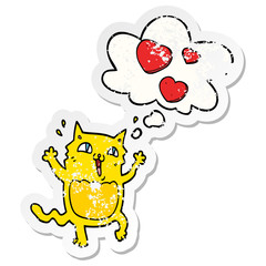 cartoon cat crazy in love and thought bubble as a distressed worn sticker