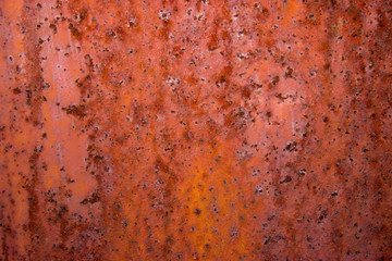 Poisonous brown background of rusty metal sheet. Abstraction.