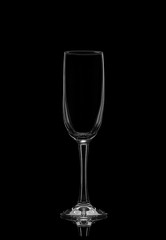 Champagne glass on a black background.