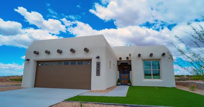 Southwest Home Exterior Clouds Timelapse. a view of the exterior of a home in New Mexico with traditional architecture timelapse